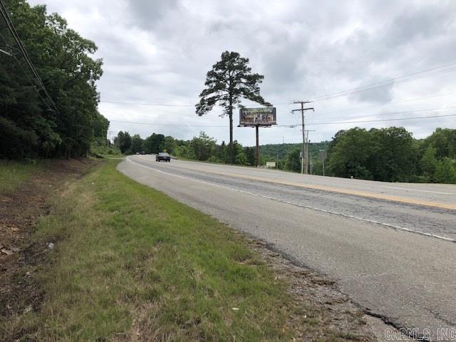 Great Highway frontage across the hwy from Bridal Fails, and just down the hill from Red River Dodge, wooded property with a view!!!!! Would make a great estate or could be used for commercial purposes, business or pleasure this property has it all. MINERAL RIGHTS DO NOT CONVEY. Great location