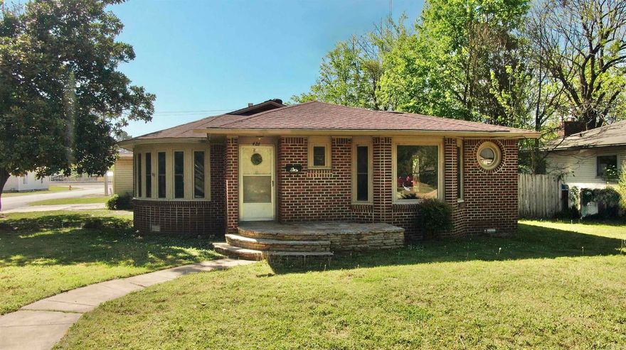 Welcome to your dream home! This beautifully remodeled vintage house boasts unique curb appeal and a blend of classic and contemporary design! Spanning just under 1,900 square feet, it offers ample space for relaxation and entertainment, with a large living room and dining room ideal for family gatherings. Enjoy year-round comfort with a new HVAC unit and a cozy gas log fireplace that sets the perfect ambiance for relaxing evenings. The kitchen features brand-new cabinets for plenty of storage, while custom windows fill the space with natural light. Parking is a breeze with both a one-car garage and a carport, and the entire home has been freshly painted inside for a clean and welcoming atmosphere. The exterior showcases vintage charm and is nestled near Stewart Park, where you'll have easy access to local amenities, parks, and schools. Don't miss the chance to own this adorable updated vintage home that beautifully combines classic charm with modern amenities—contact me today to schedule a viewing!