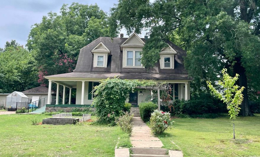 The Baldock House is a historic house at the southeast corner of South Elm Street and Woodruff Avenue in Searcy, Arkansas. It is a 1+1/2-story brick building with a clipped-gable roof and a full-width porch that wraps around to the east side. The northern (front) slope of the roof is pierced by three pedimented gable-roof dormers. This home offers a second floor that has a separate entrance. It would make a great rental or a special ABNB rental. Chandiler under stair case does not convey. Agents see agent remarks.