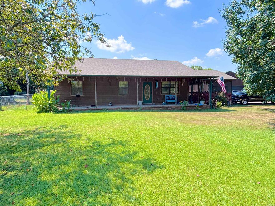 Welcome to this Charming Ranch-Style 3 bed 2 bath home in such a peaceful location with a screened in sunroom, great for all events or just to relax!  It offers 1150 square foot of comfortable living space on .32 acres. Perfectly located close to shopping, restaurants and entertainment, this home provides convenience with comfort.   Inside you will find all appliances convey including the washing machine, dryer and refrigerator, that are only 2.5 years old. This home also boasts a new water heater and a roof installed just 2.5 year ago, giving you peace of mind for years to come!!  Step outside to enjoy the fenced-in backyard- perfect for pets, gardening or relaxing-and an inground storm shelter for added safety. A detached two-car garage sits sturdy on a concrete slab offering plenty of storage and workplace!  You do not want to miss your chance!! Call today for your showing!