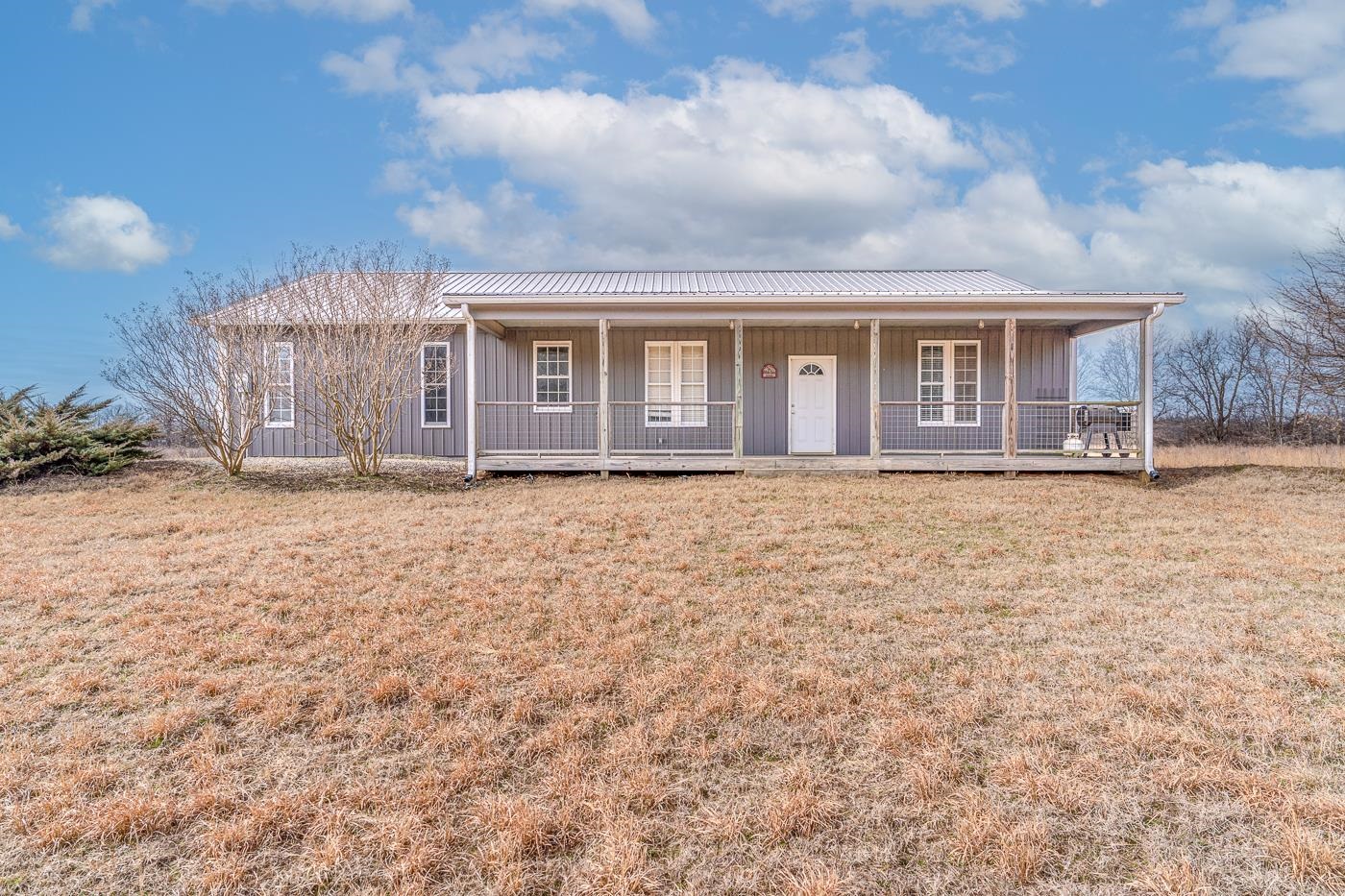 Welcome to Market 194 Sportsman Landing Road of the Huckaberry's Hideaway Sub. in Pocahontas, AR. Situated on 2.42 +/- acres and within 1/4 of a mile to the private boat ramp is a Hunter's Paradise, a turnkey lodge that is fully furnished and move-in ready. This Barndo beauty is wrapped in metal, topped with a metal roof, and accented by a 640 sf 2 car garage and a 320 sf covered front porch. The interior features 1,280 sf of well laid living space that contains an open concept living/dining/kitchen combo, 4 generous bedrooms, 2 full bathrooms with shower/tub combo, laundry room, and mudroom. You'll love telling stories around the live edge wood slab island with bar seating, wood ceilings, stainless steel appliances, easy to maintain stained concrete floor, the gated entrance, and that it comes fully furnished and with a private boat ramp so you'll be ready for the hunt on Black River at 4 a.m. Conveniently located near the Dave Donaldson Wildlife Management Area, Pocahontas Municipal Airport, favorite local retail & dining establishments, with easy access to US-67 and only 45 minutes to Jonesboro and Hardy.Ā Call today to schedule your tour and make an investment in tomorrow.