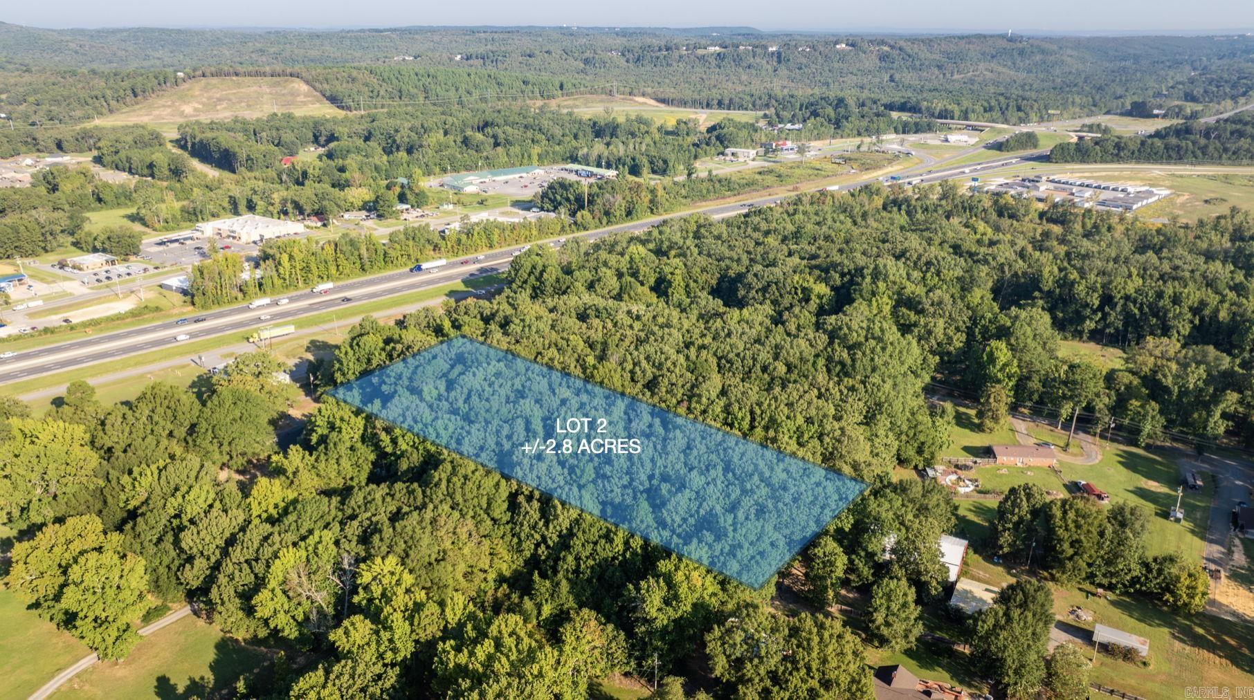 Perfect location to build your home. Convenient to the interstate. Clear as many trees as you would like and leave as much privacy as you desire. Almost 3 acres with more land available up to 6 acres. Inside the city limits of Mayflower with all city utilities available. Minimum build size 1000 sq. ft. home. No mobiles homes.