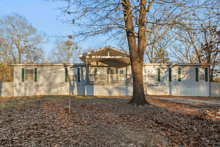 This spacious 4-bed, 3-bath home on 3 mostly wooded acres, offers the perfect blend of privacy, comfort, and functionality. With two ensuite bedrooms, this layout is ideal for guests or anyone who appreciates extra space and flexibility. Take advantage of outdoor living with a covered front porch and a fenced backyard, perfect for pets, play, or relaxing in a private setting surrounded by nature. The covered carport adds convenience and protection from the elements, making daily living easy year-round.