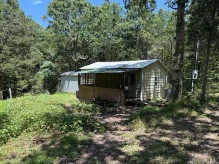 Any investors out there that like to go fishing?  Here is your opportunity to be within a few miles of the Peel access of Bull Shoals Lake.  This one bedroom, one bathroom house would be a perfect place to retreat to after a fun day fishing or playing on the lake.    This property also comes with a large outbuilding out back that is perfect for storing all that fishing gear.  This house does need some TLC but sits on 4 acres and is priced to sell!!!! Property is being sold As Is.