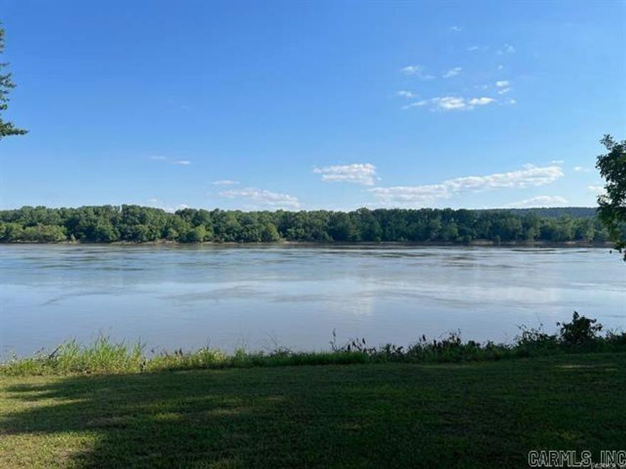 6 of the best acres on the Arkansas River up for sale.  Dead end road. One side of the property is a creek, great views, existing septic tank on property. Small Barn