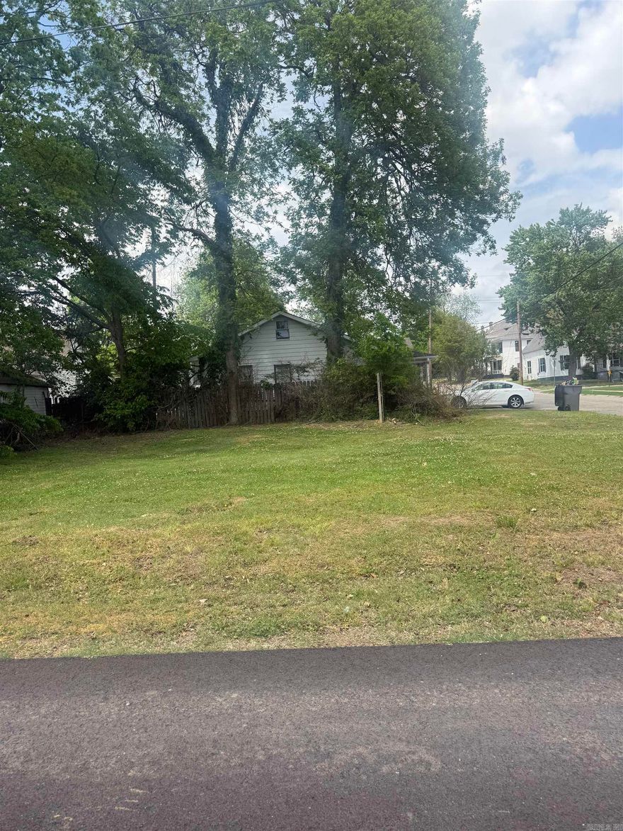 Prime residential lot in the heart of Paragould. Located just off of Court St. and only minutes from downtown Paragould, this 0.09+/- acre lot at 116 N. 6th Street offers an opportunity for investors, builders, or anyone looking to place a home in a convenient, in town location. Situated in an established area, this property is zoned R-8, allowing for residential development within city guidelines. Whether you are looking to build a primary residence, a rental property, or explore investment potential, this lot provides a manageable footprint with close access to local shops, dining, schools, and community amenities. City utilities are available in the area, make this an accessible options for your next project. Opportunities like this do not come around often in such a central location. This is an auction property. Don't miss your chance to bid on a well-positioned parcel in Paragould. Sale is subject to owner confirmation. Reason for sale is to settle the estate of Martha Lee Bledsoe. Please contact agent for additional terms and conditions for auction.