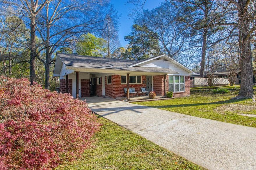 Picture Perfect Home Located in the Heart of Downtown Benton.... Amenities Include: Approximately 1260 Square Feet, 3 Bedrooms, 1 1/2 Bathrooms, Nice Living Room, Kitchen/Dining Combo, Custom Tile Shower, this home has been updated ( kitchen, bathrooms, etc. ) with all the modern finishes, refinished real hardwood flooring throughout, New roofing installed 2025, Carport, nice large lot, Benton Schools, and Much More.... A Must See....