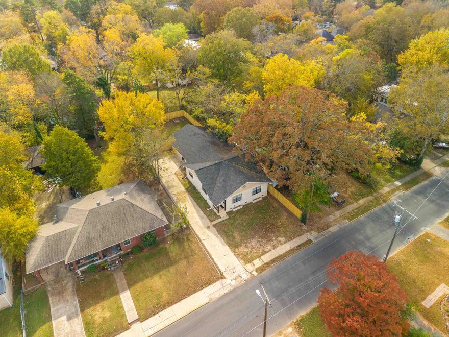 This is a MUST SEE, Charming Fully Renovated 4-Bedroom, 3-Bathroom Home With Custom Tile Baths & Modern Upgrades! Welcome to 261 a beautifully updated home that blends modern comfort with timeless style. This spacious 4-bedroom, 3-bathroom property offers a warm, inviting layout with thoughtful upgrades throughout. Step inside to an open, airy living space featuring new flooring, recessed lighting, and plenty of natural light. The large living room flows seamlessly into the dining area and an impressive custom-designed kitchen, complete with expansive butcher-block countertops, stainless steel appliances, abundant cabinetry, and open shelving, perfect for cooking, entertaining, and everyday living. Each of the three bathrooms has been fully renovated with custom tile work. The home’s generous bedrooms provide comfort for family, guests, or a flexible setup for extra space with a bonus den area. Outside, you’ll find a freshly fenced backyard, new HVAC, new roof and a long driveway offering plenty of parking all just steps from Oaklawn and centrally located to everything in town. This home is move-in ready and truly one of a kind!