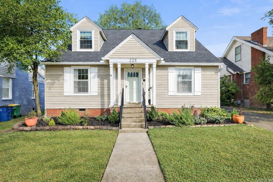 Welcome to 229 E B Avenue—pure Park Hill charm on a postcard-perfect, tree-lined street, just minutes from lakes, parks, dining, shopping, and zoned for Lakewood Elementary. Sunlight pours into every room, warming original hardwood floors and highlighting the home’s timeless character. The spacious kitchen delivers generous prep space, a cozy eat-in nook for slow mornings, and a designer dining room framed by elegant French doors—ideal for everyday meals or memorable gatherings.  The layout lives beautifully with a main-level primary bedroom and updated bath, plus two roomy upstairs bedrooms anchored by an updated guest bath. Out back, a bright sunroom-turned-mudroom with charming case windows opens to a sweet patio—perfect for morning coffee, evening grilling, or winding down after the day.  A rare detached two-car garage with a fully floored attic adds exceptional storage and flexibility, and the bespoke Samsung refrigerator conveys. Big-ticket updates are already handled: Roof 2025, Water Heater 2024, HVAC 2020, Sewer Line 2019, Water Supply Line 2024.  Classic, comfortable, and undeniably Park Hill—229 E B Avenue just feels like home.