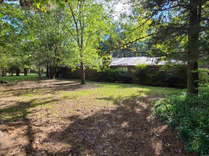 Welcome to your peaceful retreat!  Just a few short minutes from the hustle and bustle of town, this beautiful brick home nestled on just under 3 acres of land, offers the perfect blend of nostalgia and potential. Whether you are looking to embrace the charm of an old homeplace or transform it into something uniquely yours, this property has it all! The cozy interior exudes the warmth of old-fashioned Sunday meals and family gatherings with timeless charm and plenty of space to add your personal touch. The expansive lot of nearly 3 acres has a picturesque pond, relazing gazebo and large barn ideal for storage. Don't miss the opportunity to make this home yours. Contact us today to schedule a tour and see everything this property has to offer. Call or message today to learn more!