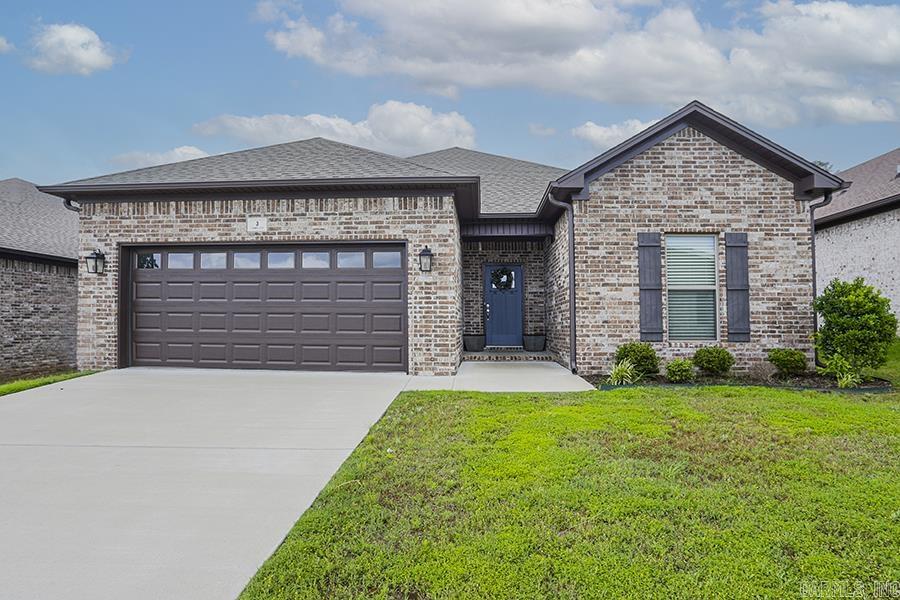 Darling one story home in the heart of Maumelle! Easy walk to restaurants, miles of walking trails, Lake Willastein, park and playground, fishing, activities and concerts. Custom built open floor plan with hardwood floors and timeless amenities, easy to decorate to your preferences. Kitchen with beautiful quartz countertops with tile backsplash, oversized island with breakfast bar, gas stove and huge pantry. Private primary suite separate from two other bedrooms and hall bath. Custom tile in Laundry with sink. Enjoy the outdoors under your covered patio with ceiling fan and a fully fenced backyard.