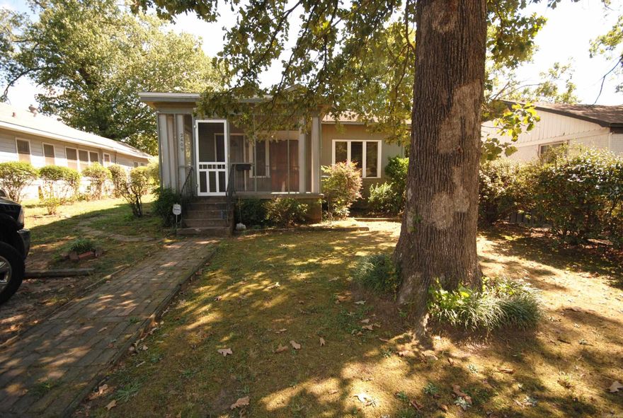 Property backs up to Horse Mann Middle School. Parking in front and covered in back. Roof is approximately 10 years old. Plumbing has been replace and is PVC throughout house. Original wood floors are still present. Home is heated cooled via window units and gas room heaters. Appliances (now removed) leaked on kitchen floor so some of subfloor may be damaged. Storage building in backyard. Possible commercial zoning due to commercial at end of block. House is being sold "as is". Seller will make no repairs. Seller Property Disclosure is not available. Seller has not resided in the home.