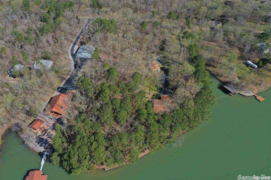 Build your dream home on Lake Hamilton. This property is approximately 2.61 acres with 206' of lake frontage. City water available across the street. Seller has a perk test, survey and elevation certificate available.