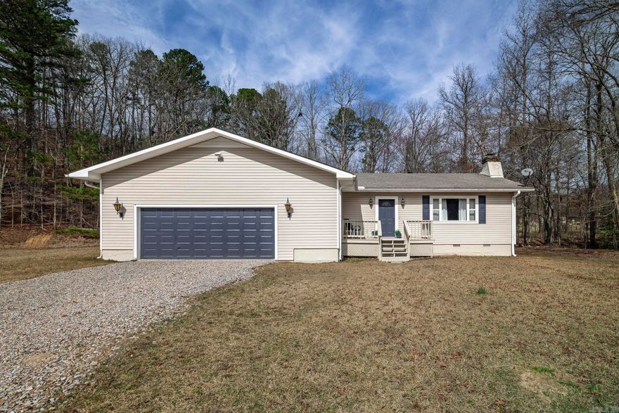 Charming 2 Bedroom, 2 Bathroom Home in a private setting. Nestled in a peaceful, private location, this well-maintained home features an open and spacious living room with a cozy stone hearth surrounding a wood-burning stove insert—perfect for creating a warm and inviting atmosphere. New HVAC in 2025. Lovely flat yard and an area for a garden.The oversized 2-car garage offers plenty of room for your vehicles, plus additional space for tools, projects, and storage. Enjoy the bonus of a small workshop in the backyard with electricity. The covered deck at the rear of the home is a great spot to unwind and enjoy the tranquility of your surroundings. Located in the highly sought-after Fountain Lake School District, this home offers both comfort and convenience. Don’t miss the chance to make it yours!