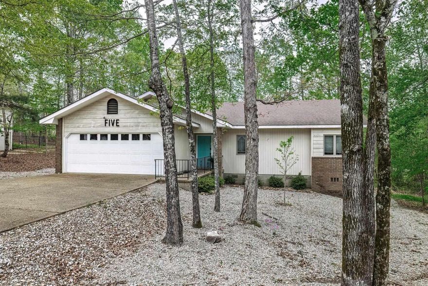 Perfect vacation home or stress free resort living. Enjoy this 3 bedroom, two bath, 2 car garage with flat driveway, open concept home conveniently located near golf courses, walking trails and fitness center. House was professionally renovated 2021. Every surface is new from LVP flooring, updated baths and showers with custom tile, living room ceiling is vaulted, all new recess lighting with dimmers.  Designed kitchen includes island and granite countertops, and offers all new appliances including smart refrigerator. New window coverings and ceiling fans. Enter the back deck from dining area. HVAC is 14 Seer on twice annual inspection.  Crawl space has lots of space including floored area for workshop. House lives much larger than it truly is. This is a special home, don’t miss out on this one. SEE AGENT REMARKS. HSV POA Fee is $2,000