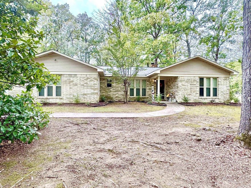 Don't miss your chance to own this beautiful home on the outskirts of White Hall! Featuring large closet space in each bedroom, new windows & roof installed in 2019, & a spacious yard with a handy storage shed. This gem is nestled in a quiet cul-de-sac, perfect for peaceful living. Imagine enjoying cozy evenings by your backyard fire pit. This is a great spot to create lasting memories!