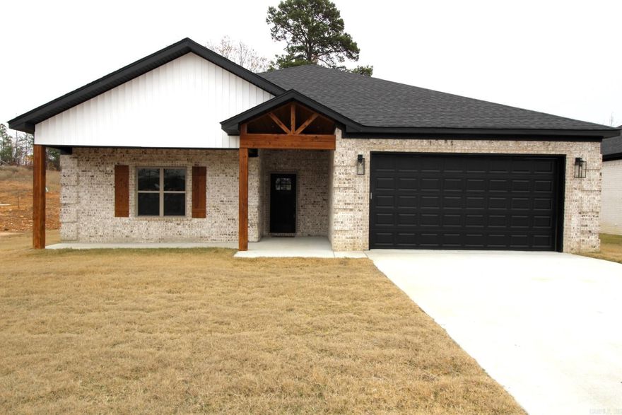 NEW CONSTRUCTION UNDER $300K NEAR LRAFB!  3 BR 2 BA very open floor plan with split bedroom setup. Greenspace at rear of home. Back deck faces east... so deck is enjoyable on hot afternoons too. Home also has a large front porch area that is hard to find in most new construction. No carpet, LVP floors thru out.  Marble, leathered granite, ss appliances, all electric , energy efficient home . Brick exterior. No steps at front entry. Country setting off HWY 107 and  General Samuels Road, actually closer to Sherwood than Jacksonville! No Improvement Tax.