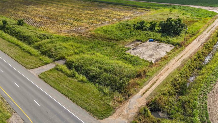 Looking to buy or invest on Highway 65? Check out this beautiful lot that is almost an acre! Experience the benefits of having major highway traffic and exposure! Contact Kara Beth for more information.