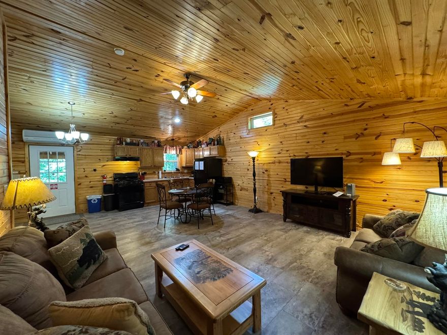 Escape to the serenity of nature in this charming cabin, featuring a great room floor plan in the Woods near the picturesque Buffalo River! Nestled on 17 breathtaking wooded ac m/l, this idyllic retreat offers the perfect blend of tranquility and adventure. Immerse yourself in the stunning surroundings as you hike through lush forest trails, or float & fish in the crystal-clear Buffalo River, or simply relax on the cabin's spacious front & back decks. With its rustic charm and modern amenities, this cabin could be your home away from home. Experience the beauty of nature and create unforgettable memories. Currently used as a Very Popular Vacation Rental. Recently updated with a new heating and cooling system. Just in case you’re looking for an investment opportunity. Call to set up your showing appointment today!
