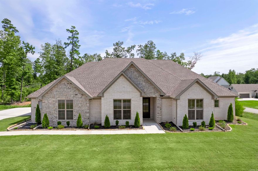 $10,000 in CLOSING COSTS PAID WITH ACCEPTABLE OFFER. This exclusive gated community in the highly sought-after Avilla community in Bryant School District offer a perfect blend of luxury and comfort. This stunning new home features four spacious bedrooms, three full baths and a three-car garage, designed with both elegance and functionality in mind. This home high-end finish outs that set it apart. Rich hardwood floors flow throughout the main areas, adding warmth and elegance. Custom cabinets and quartz tops enhance the kitchen and baths with a sleek modern touch. The stunning trim package elevates the homes design in all the right places to showcase the expert craftmanship. Every detail has been carefully considered to create this inviting atmosphere to truly make it stand out. Agents see remarks.