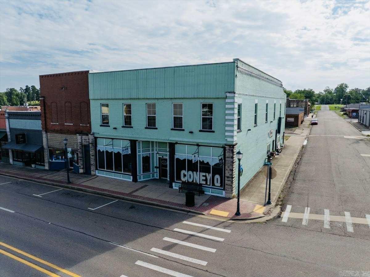 Looking for an inspiring investment opportunity in The heart of Mena? This one of a kind, beautifully restored, HISTORIC 2-story building is brimming with opportunity! Currently home to multiple income generating businesses, this building has so much to offer and even more potential! Step inside and you’ll see a BEAUTIFUL, spacious storefront currently operating as an ice cream shop. With floor to ceiling windows, original hardwood floors, two bathrooms, and a unique upstairs loft space, there is no other building in town with this level of historic charm! Upstairs you’ll find a gorgeous DANCE STUDIO currently being used for yoga and dance classes. On the first floor there are 2 additional retail spaces which are currently occupied, as well as a large storage room. The building also includes a completely renovated 2bed/2bath fully furnished SHORT TERM RENTAL LOFT with a spacious deck and hot tub! With so much anticipated growth in our tourism sector, this building could be an excellent investment for the right buyer!