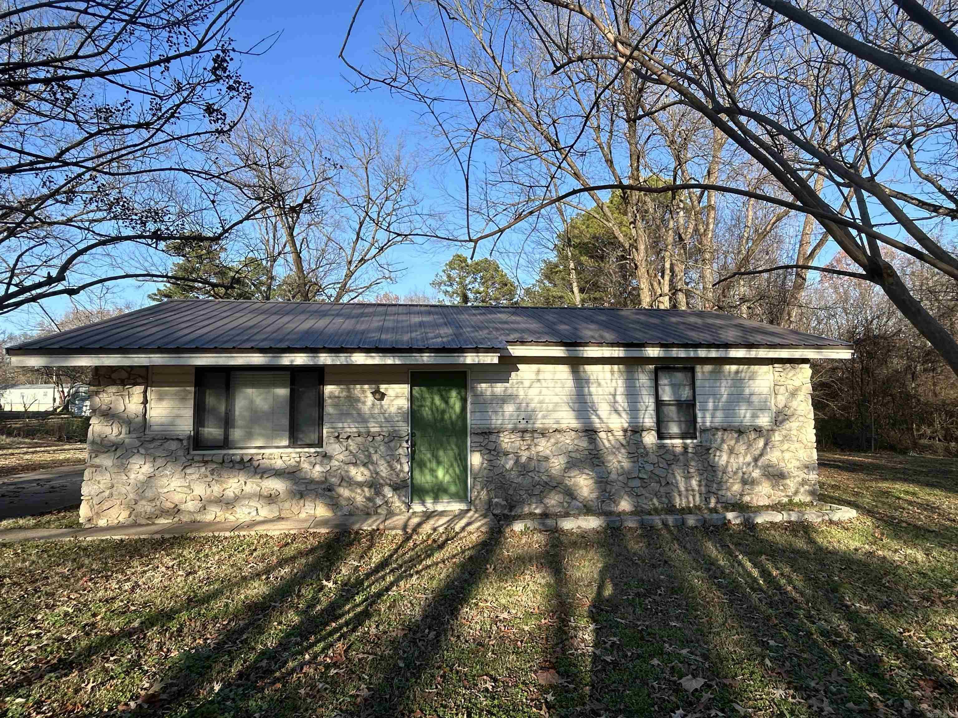 Charming 2-bedroom, 1-bathroom home situated on over an acre in the quaint town of Bradford. This move-in-ready property offers peace of mind with an HVAC system and metal roof, both replaced in 2019. Perfect for first-time buyers, downsizers, or investors, the spacious lot provides plenty of room to enjoy the outdoors or expand. Don't miss this opportunity to own a well-maintained home with small-town charm and modern upstairs! Freshly remodeled bathroom with tiled shower.  New Refrigerator Stays. Large 18x36 Shed in Backyard Conveys!!! New Paint Throughout, New dishwasher. Stove is like new. Schedule your showing now!