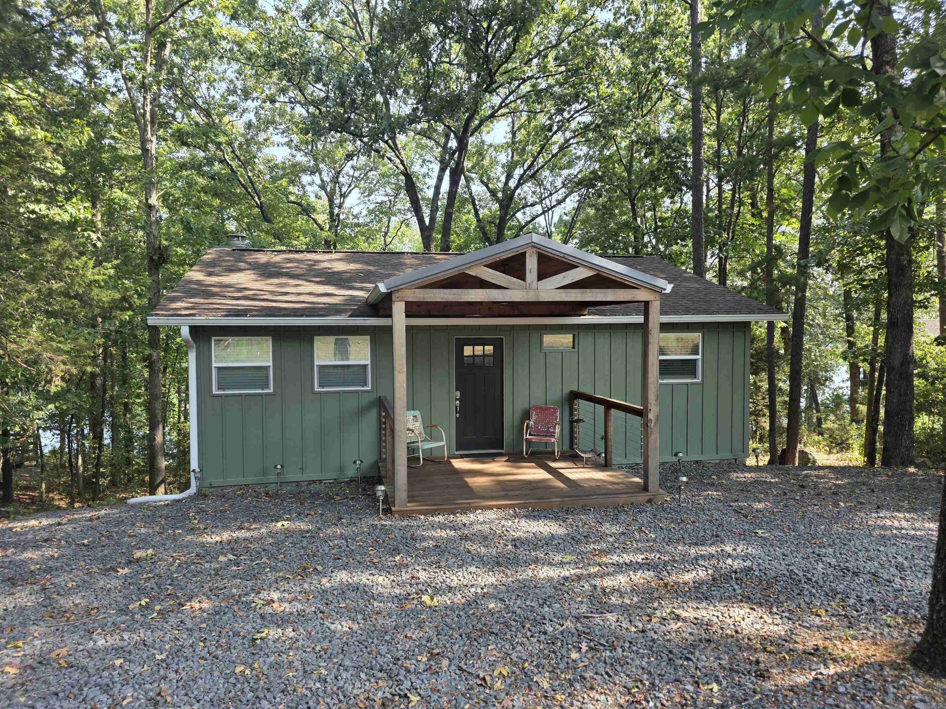 LAKE LIFE awaits you in this almost 1800 sq ft, 4 bed 2 bath LAKEFRONT home. Easy walk to the shoreline and very low white line so your view could really be opened up on this one. It is very rare to have both Lakefront and a good lake view! HVAC is only 2 years old and brand new large deck with cable for an unrestricted view of the lake! Freshly painted new Hardie board exterior and new LVP flooring throughout. This is the first time this home has ever been on the market. Has been in the family since it was built in 1978. You don't want this one to slip by you!