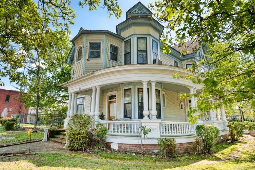 Restore this Charming Victorian home, built in 1884, back to its original glory.  This home was formerly a Bed-n-Breakfast and is located just minutes from the heart of downtown Hot Springs.  Step back in time to enjoy the elegant entryway leading to a parlor and formal dining room. Don't forget to check out the study before heading up the stairway to the 7 bedrooms with timeless period furnishings.  Enjoy the light streaming through the stained glass windows. Take in the open feel of the soaring ceilings as you make your way to the floored attic with a bar.