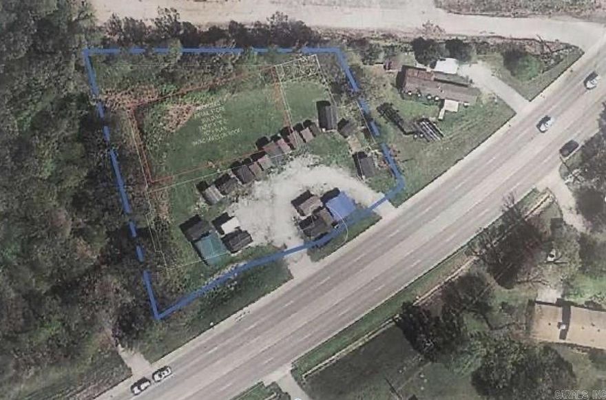 Zoned Commercial. Approximately 270' of frontage on Highway 49/Linwood Drive in a high traffic area, within Paragould city limits. 20,361 estimated daily traffic counts from 2022. Two adjoining lots total approx. 1.19 acres. Suitable location and land for office, retail, medical, etc.  Currently used to sell portable buildings - the property is NOT under a lease and there are NOT permanent structures on the property.  Possible owner financing for a gap period while a buyer obtains more permanent financing, similar to an option to buy.