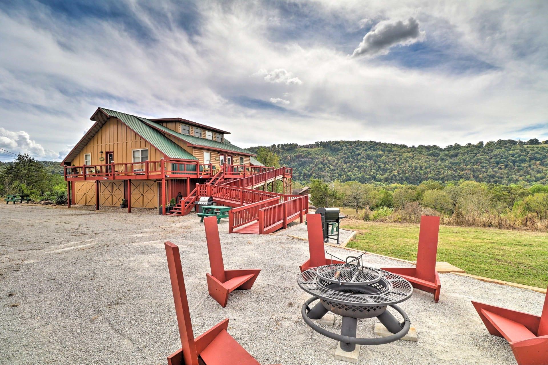 FULLY FURNISHED FISH TALES LODGE is available to purchase!! This property offers an amazing view of the mountains and is located minutes from the famous White River, Sylamore Creeks, & Downtown Mountain View! It is currently being used as a nightly Vacation Rental but has endless possibilities. It features 4 identical units all on one floor with handicap accessibility and a private entrance to each! Each unit has an open kitchen/ living area, bedroom, 1 bathroom, plus an open loft serving as an additional bedroom as well as access to a shared laundry room. Below the units you will find tons of storage! 3 separate storage rooms as well as boat or RV storage! *All items will convey minus personal items, supplies, & items inside storage rooms*