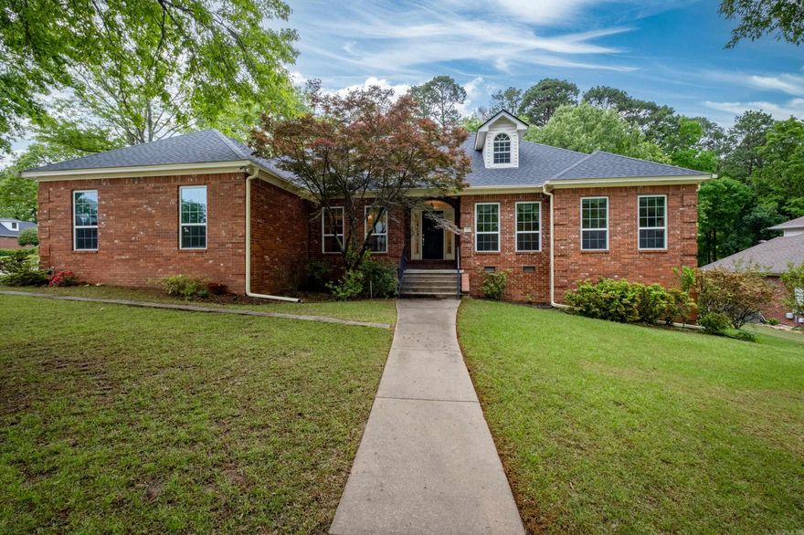 Beautiful brick house on corner lot in desirable West Little Rock's St Charles Addition.  Main level has primary bedroom w/ bath & his and her closets, 3 additional bedrooms (split bedroom plan), hall bath, large eat-in kitchen w/ desk, plenty of cabinet space & pantry, laundry room w/ sink, dining room, & great room with fireplace (gas logs).  Upstairs is a large room that could be a 5th bedroom or playroom with its own full bathroom.  This one owner home was built by Billy Hartness Construction in 1994/1995.  Side load 2 car garage, sprinkler system, great closets for storage, new roof in 2022, wonderful backyard deck, new windows in 2017/2018, and new interior paint in some areas (where wall paper was removed).  Call today to see this amazing house! Agents See Remarks