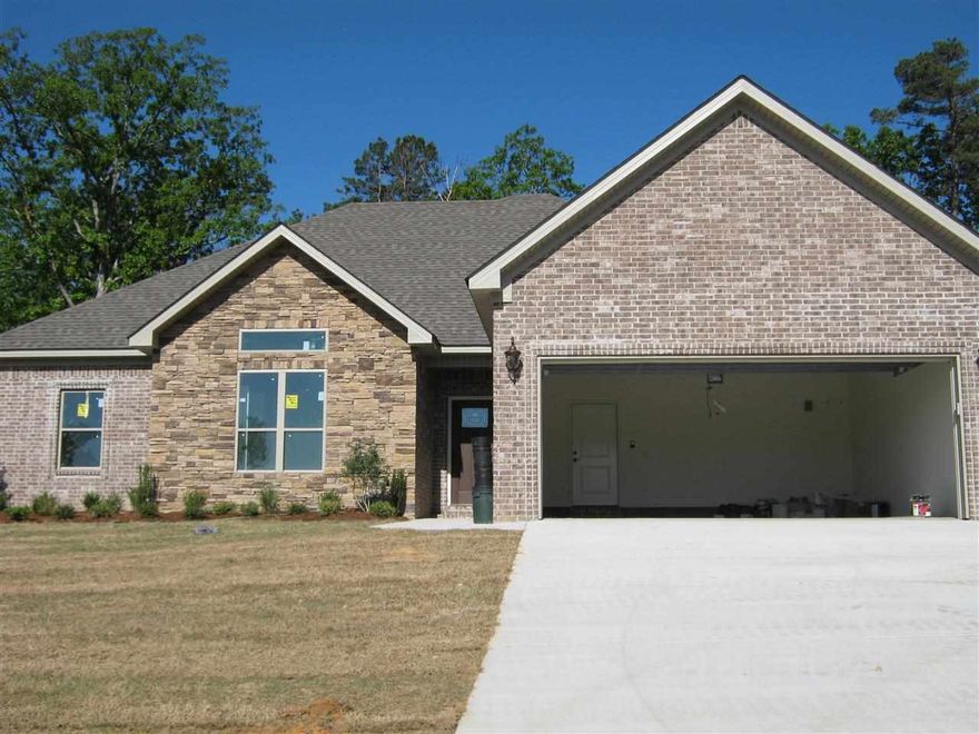 Home backs up to green space, Hardwoods in main living areas, granite and tile are in wet areas.  Master is over sized  with large walk in closet.