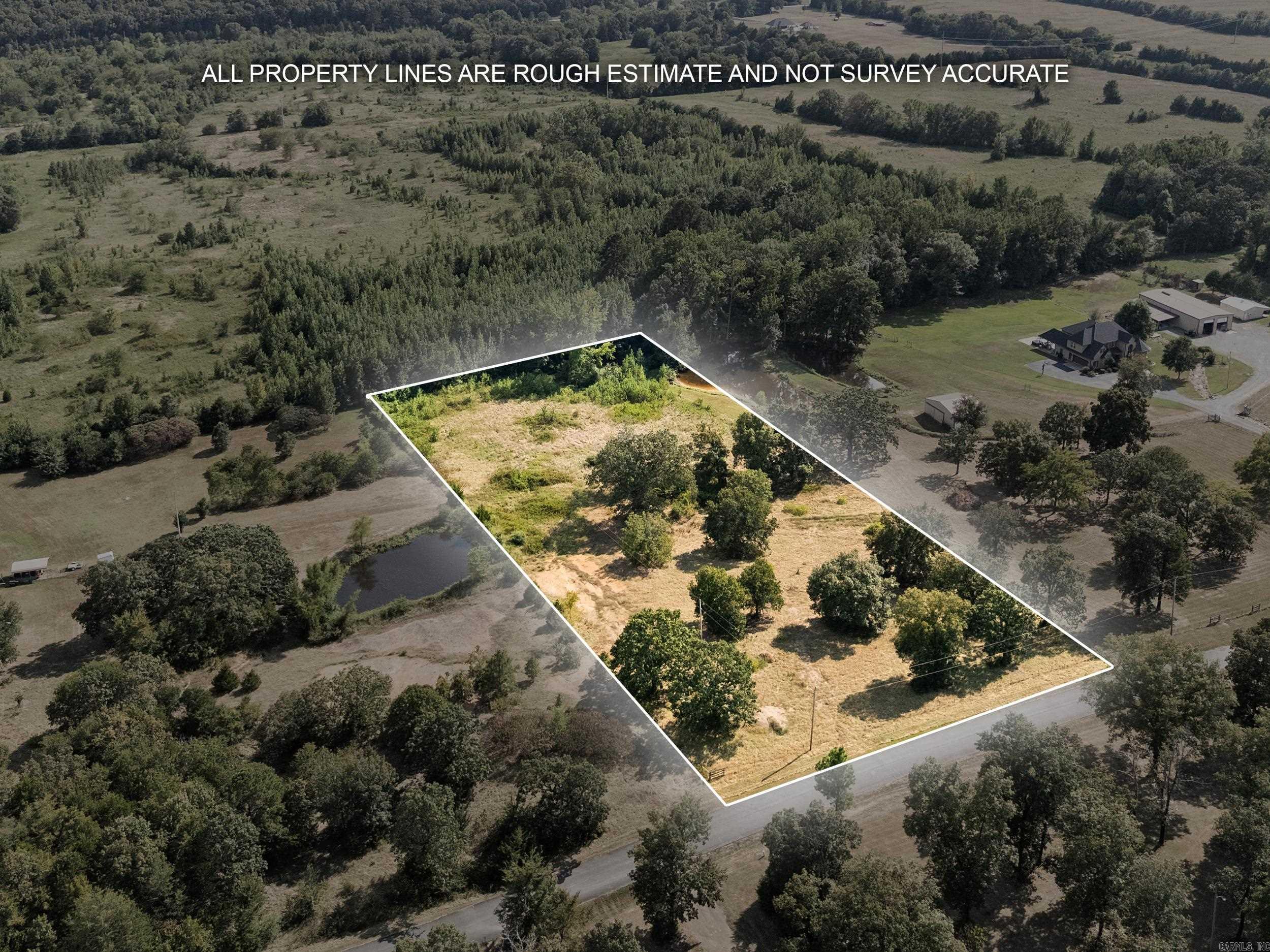 Beautiful 4 acre lot to build your dream home! Partially fenced lot on cul-de-sac subdivision street features mature trees, views, a wet weather pond on east and west edges of the property and plenty of open space to build on!