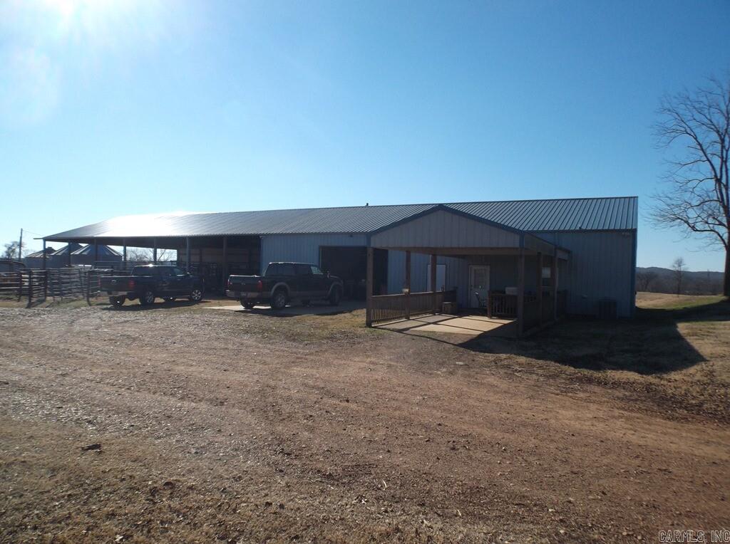 PREMIER 700+ ACRE CATTLE FARM ON SPRING RIVER!! This rare farm is located in the foothills of the Ozarks and has everything you're looking for. 450 acres of Bermuda grass pasture, 3 ponds, 263 acres of woods plus 3/4 mile of beautiful Spring River frontage. This is a working cattle farm and offers two 15 ton hopper bottom feed bins, three 3,000 bushel grain bins, barn with three rooms, hot and cold water and a loft for hay storage. A shed with 4 stalls and storage room. Also offered is a 2 bedroom, 2 bath in shop home connected to a work shop that is insulated and wired. The work shop leads to a covered cattle working area. All under same roof , a 4 hole shelf watering system, metal hay barn that holds 300 round bales of hay, 2 cattle guards. The under roof cattle working area offers 4" steel post, 2 3/8" pipes, swing gate, Peerson Squeeze chute and holding pins to separate cattle. Fences are good with 3 gates. This superb cattle farm is located close to Imboden and Pocahontas, Arkansas.