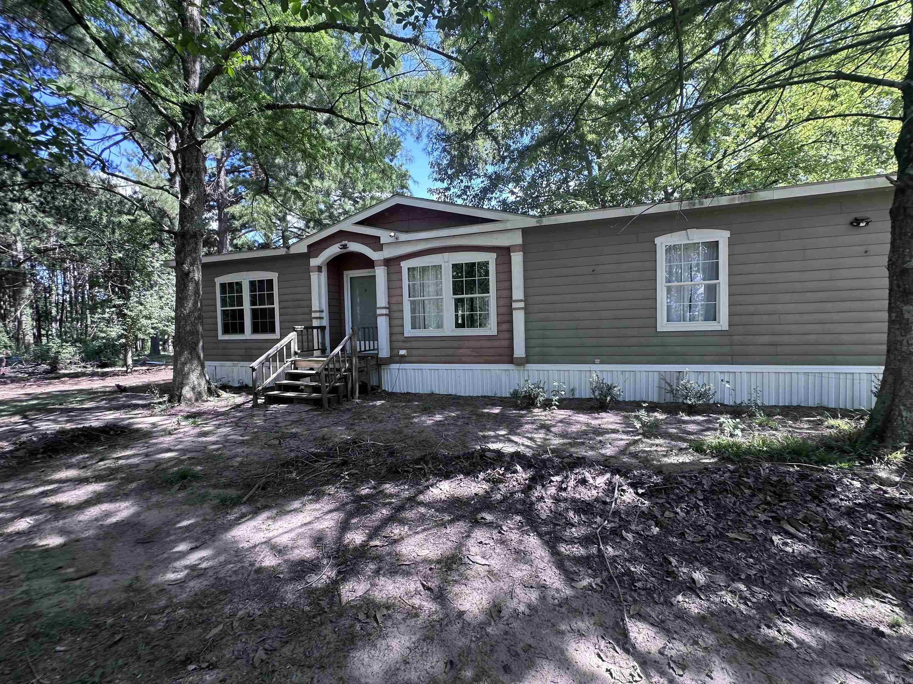 Charming Country Retreat – 4-Bedroom, 2-Bath Home on 10 Acres Experience the best of country living with this beautiful 4-bedroom, 2-bath mobile home set on 10 peaceful acres. The spacious layout offers comfort and functionality, with two full bathrooms for convenience and privacy. Outside, enjoy wide-open views, plenty of room for gardening, animals, or outdoor recreation, and the tranquility of rural life. Whether you’re dreaming of a private retreat, a hobby farm, or simply more space to breathe, this property delivers.