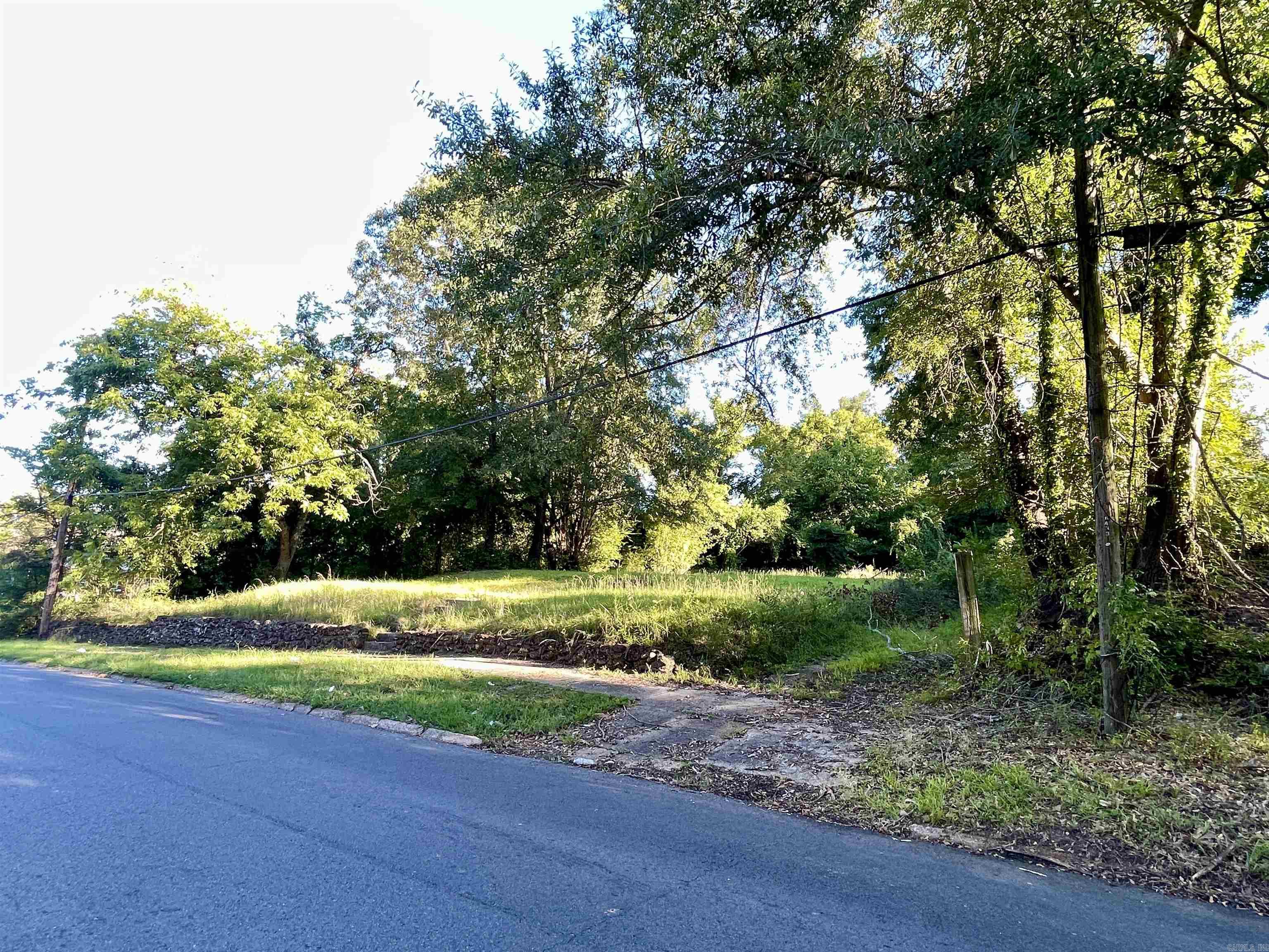One of three lots for sale on Maple St! This beautiful residential lot, perfect for a single-family home or multi-family development, is nestled within a short distance of the charming, historic downtown area of Camden. The property offers convenient access to the town's rich history, local shops, and dining, making it an ideal location for those who appreciate small-town charm with modern conveniences. With easy access to utilities in an established neighborhood, you're a step ahead for a new build, providing a hassle-free start to your construction project. The peaceful surroundings and prime location make this lot a wonderful opportunity for homeowners or investors alike. Please refer to the zoning ordinance information on file. **Also see 428 and 437 Maple St** Seller will give priority to a buyer purchasing all three lots