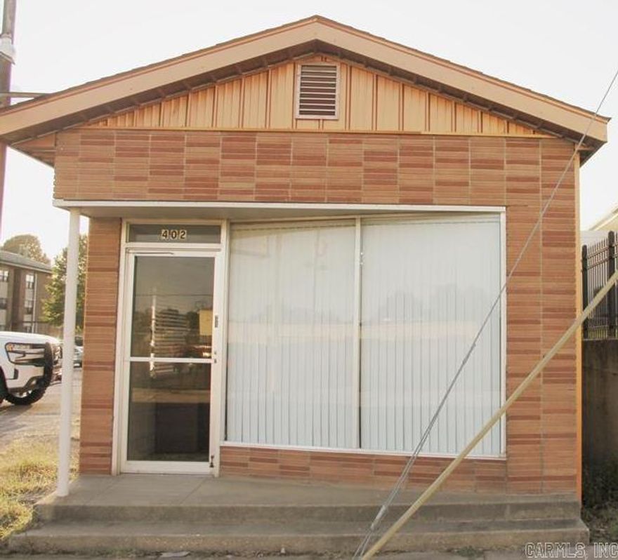 2 office spaces and 1/2 bath. Perfect for small business needing office space!