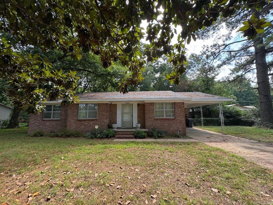 Peaceful country sitting but actually in town. This large tree lined lot gives you the feeling of seclusion but is close to all the amenities Jonesboro has to offer. Ranch style brick 3 bed 1 bath ranch home. Home features updated bath, kitchen, flooring and paint. There is a large fenced in backyard for your fur babies.