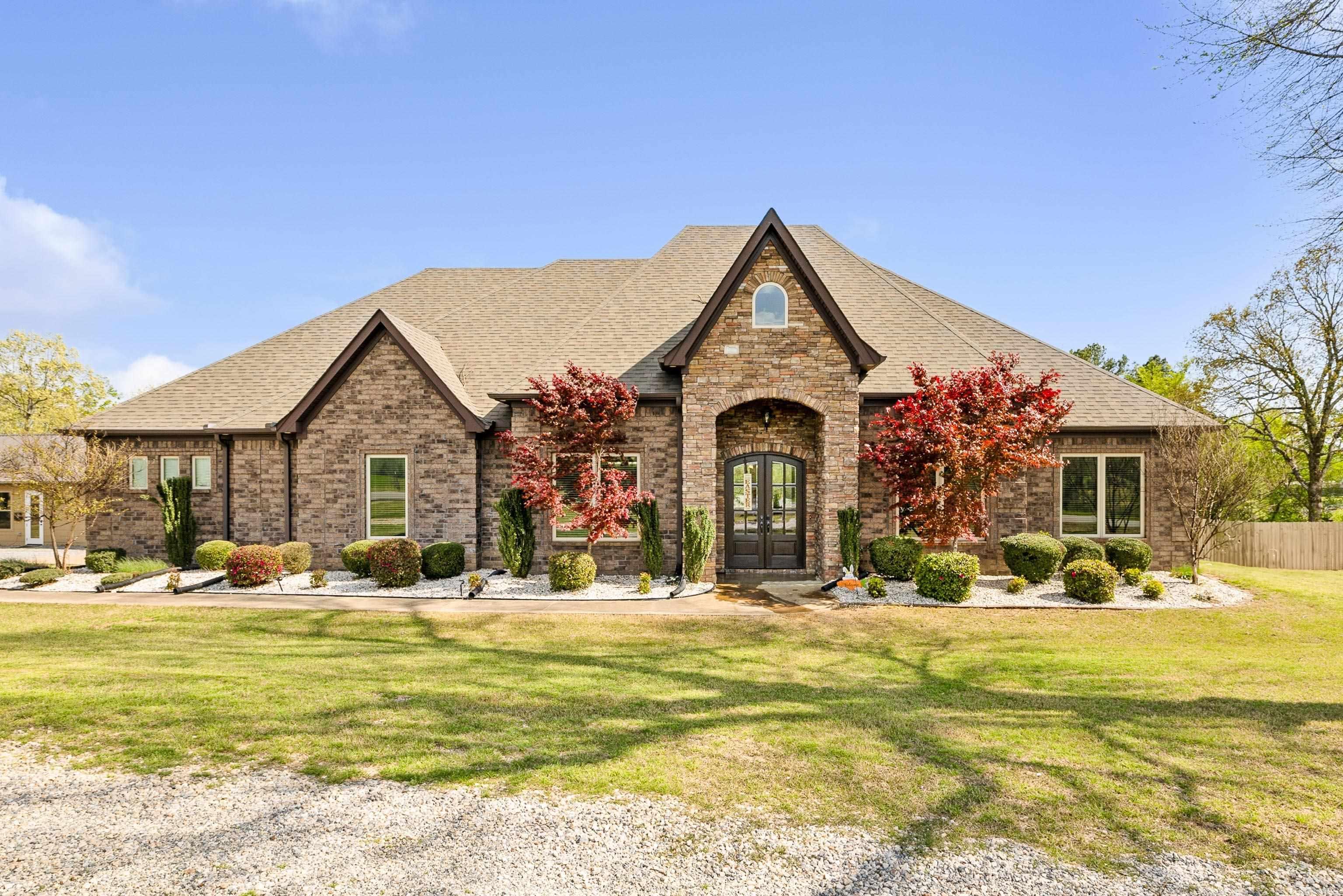 Rare gem in Saline County, offering a blend of privacy and luxury on just over an acre, under appraised value! This beautifully updated home features 3 bedrooms, 2.5 bathrooms, & an office on the main level, along with a large bonus room that can serve as a 4th bedroom with its own full bathroom. Key features include an inground saltwater pool complete with a sitting ledge & diving board, as well as a fully fenced yard. Expansive 40 x 100 heated/cooled shop is perfect for gatherings, featuring double bay doors that make it easy to entertain. Recently added- single car garage, meeting room, office, & half bathroom creating an excellent work-from-home setup. Plus, fiber internet! The kitchen features granite countertops, ample counter space, and a pantry for all your needs. Enjoy a formal dining, perfect for hosting large gatherings. The primary suite offers a private space with a large bathroom and closet, ensuring comfort. The outdoor space includes wired speakers and a hot tub, summer pool parties- here we come! New roof, pool liner, updated LED lighting, interior paint all in 24'. Bryant schools, minutes from Bethel. Tour today, and enjoy a summer staycation! Agents see remarks.