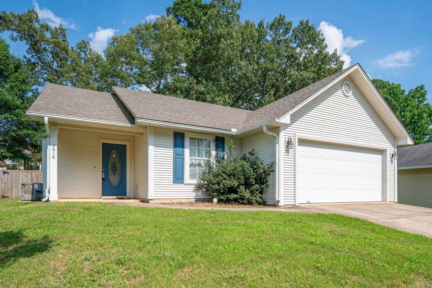 Move in ready 3 bed 2 bath home in Benton! Wonderful open floor plan with nice living room, dining area, and kitchen. Large living room with fireplace, great natural light. The kitchen has white painted cabinets, granite countertops, and stainless steel appliances. Refrigerator included. The primary bedroom is spacious with a walk-in closet. Two guest rooms share a hall bath. Outside, there is a welcoming front porch, fully fenced nice sized backyard and a two car garage!