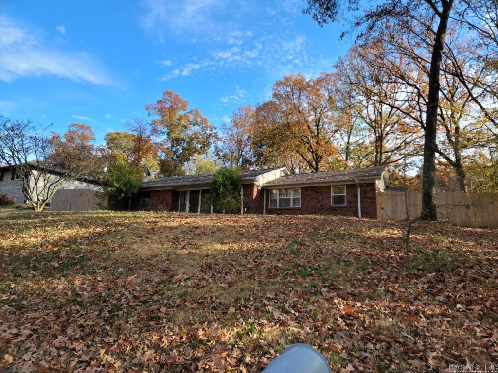 Interested in a gorgeous home in one of the most sought after neighborhoods in Wynne? This is IT! Some of the things we think you'll love most...an absolutely stunning kitchen, an all seasons room with unique brick flooring and a wood burning fireplace in the living area. This is a split floorplan and has been updated nicely. (Especially that kitchen) You are perched atop a hill with a very private and large back yard. So much to love here- let's take a tour! Current/recent inspections available for review