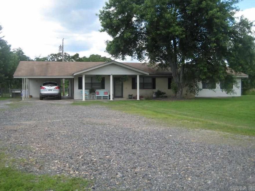 Nice brick and vinyl home on small acreage, fenced backyard, patio, shed, creek and an above ground swimming pool.  2 water heaters.  New CH/A in 2015.  City water and a well for the yard/garden.  Wood laminate floors.  New kitchen counter tops.  Very nice. 2 bedroom with bonus room that could be a 3rd bedroom.