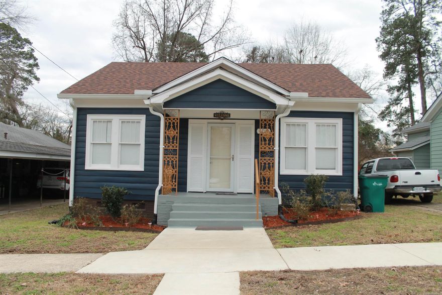 Cute and cozy 2 bedroom, 2 bath home completely remodeled and ready to enjoy. Home improvements within the last 3 years include: new roof, new exterior and interior paint, new central heat and air added, new electrical, new flooring and refinished hardwood floors, 2 new bathrooms with walk-in showers, new lighting and ceiling fans, granite countertop in kitchen and all new appliances including gas stove, dishwasher, and refrigerator. Side porch was added and gutters installed.