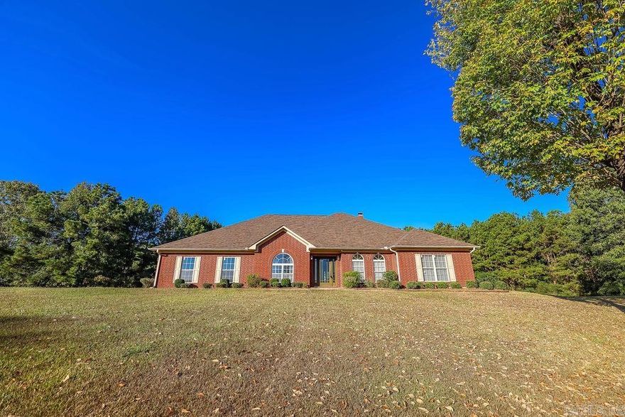 4 bedrooms, 3 bathroom home located in desirable Woodwinds.