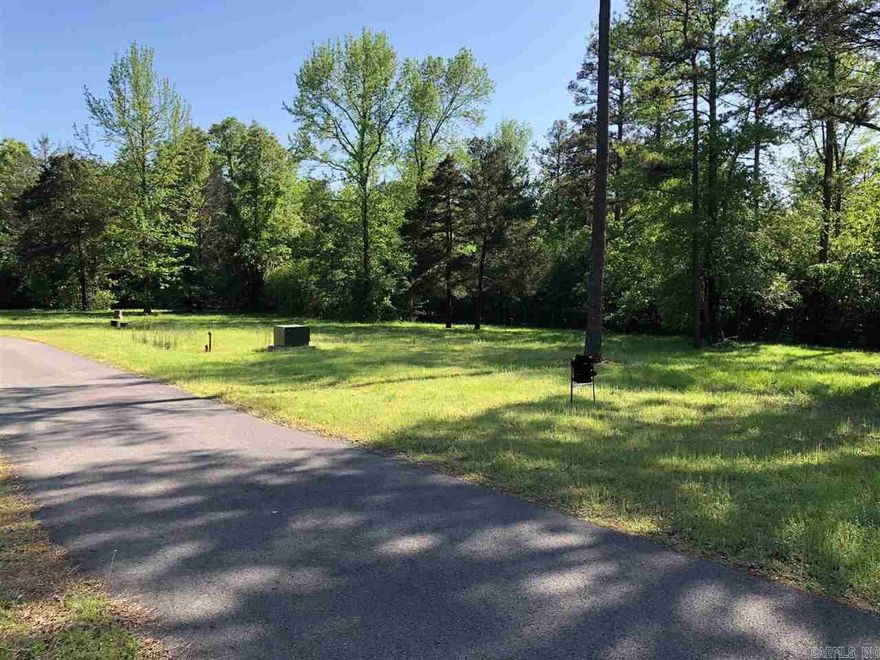Vacant Lot to build your Lake House on, in one of the only Gated communities in Greers Ferry that has multiple amenities including swimming pool, picnic area, tennis courts, basketball court, horseshoe pits, playground, PLUS trash pickup & yard maintenance too. Shiloh Marina is right around the corner for quick lake access to your boat slip or launch at their boat ramp. Water & Electric at property, buyer will need to install grinder pump tank to connect to community sewer. The only lots left are Lot 32 ($14,500),  34R ($27,500), Lot 53R ($27,500), & Lot 43R ($32,500).