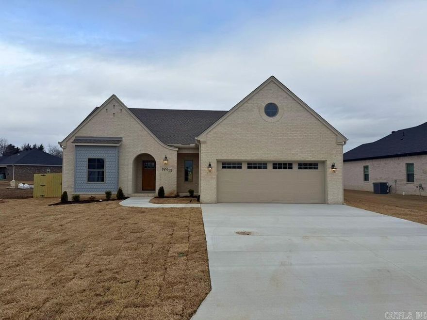 Sold before listing - Stunning new construction Cottage-style home by Sage & Stone Homes, offering 3 bedrooms, 2 bathrooms, and a versatile office/flex room. Designed with 9-foot ceilings throughout and a vaulted living room ceiling, this home features high-end finishes like quartz countertops, LVP and tile flooring, and tiled showers, with the master bath showcasing a walk-in shower and indulgent soaker tub. The kitchen boasts stainless steel appliances, a gas range, a pot filler, and a spacious walk-in pantry, living area with wood beam accents. Step outside to enjoy the covered back patio, perfect for relaxing or entertaining. Thoughtful touches like a sink in the laundry room.