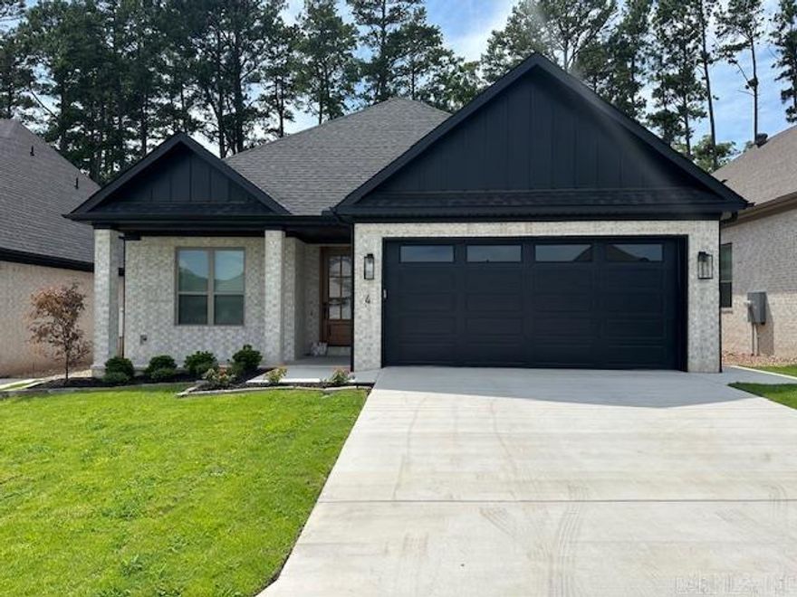 Experience luxury living at its finest in one of the most coveted West Little Rock communities, Woodlands Park! Say goodbye to lawn care hassles, as front and back lawn maintenance is included with your annual fees.  Step into an open-concept floor plan that seamlessly blends functionality with visual appeal. Every inch of this home has been thoughtfully designed, featuring custom cabinetry, sleek quartz countertops, and stylish lighting and plumbing fixtures. The owner's suite is a serene retreat, boasting dual vanities, a soaking tub, an oversized walk-in shower, and a dream-worthy custom closet.  With too many features to list, this stunning home truly has it all. Estimated completion is mid-September 2024.