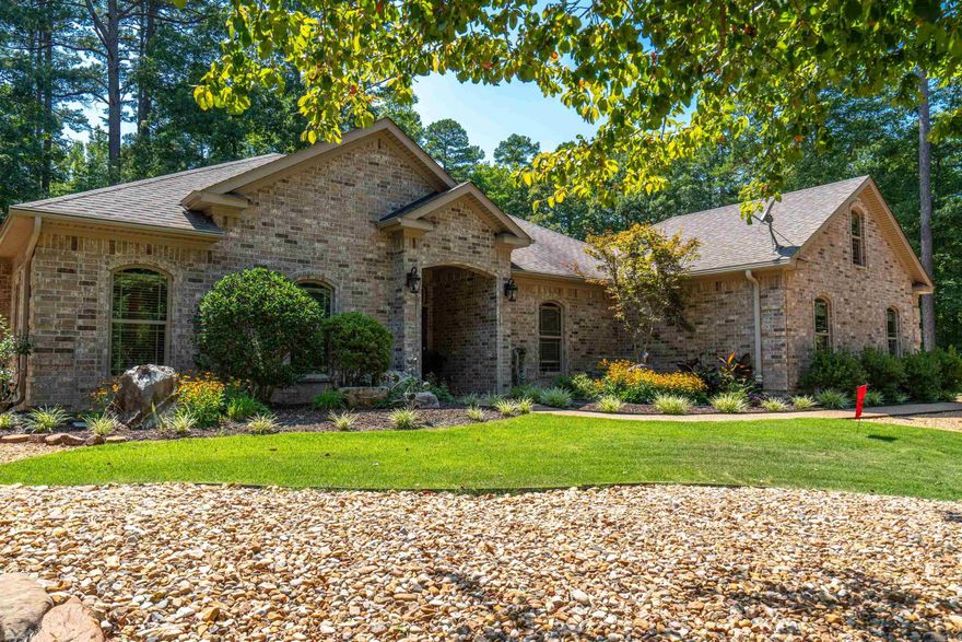 Welcome to 9 Zarpa Way! Pride in ownership shines bright with this home from the immaculately landscaped low maintenance yard with added French drains to the crown molding, granite counters, custom Renew by Anderson windows and office/bonus room with tons of natural light. The home sits on a large corner double lot and offers a 3 car garage with floored bonus/storage space above. Located in the beautiful gated community of Hot Springs Village. Call listing agent for more details and schedule your personal tour.