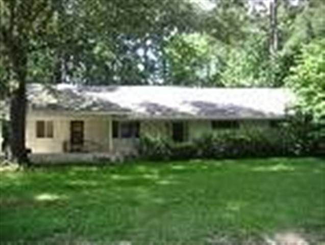 Well constructed 4BR home in Dollarway. Property includes 2 lots---one the house is sitting on and one next to house. Beautiful hardwood floors, formal living room, large den, floored attic and large work shop. ALARM .