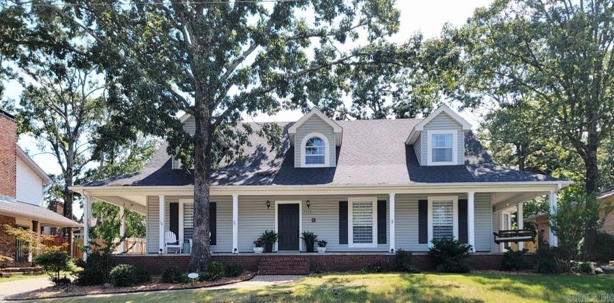 Choose to relax on your covered front porch or from your three separate covered back patios guaranteed to have songbirds to keep you entertained.  Walking into the front door you are greated with an open floorplan that invites you to sit at the dining table or flow into the great room to take in the abundance of natural sun light. Then you are welcomed into the modernized kitchen to make any foodie feel at home with top of the line appliances with wine cooler and eat in kitchen space.   Primary en suite has a private entrance to patio,  two walk in closets, shared double vanity, water closet and jetted spa tub to soak your day away.   Upstairs features a secondary entertaining space between the two bedrooms. Sellers have consistenly modernized the home to make it a cozy, welcoming sanctuary.  Too many to list all but to name a few new roof installed 2023, new upstairs AC in 2025, main HVAC 2021, upstairs LVP and carpet in 2024, toilets 2023, primary shower 2024, kitchen appliances and under counter wine cooler 2025. Do you need plenty of storage? This home has an abundance of storage space. What are you waiting for?   Call today for your private showing and fall in love.